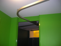 Curved track for ceiling hoist
